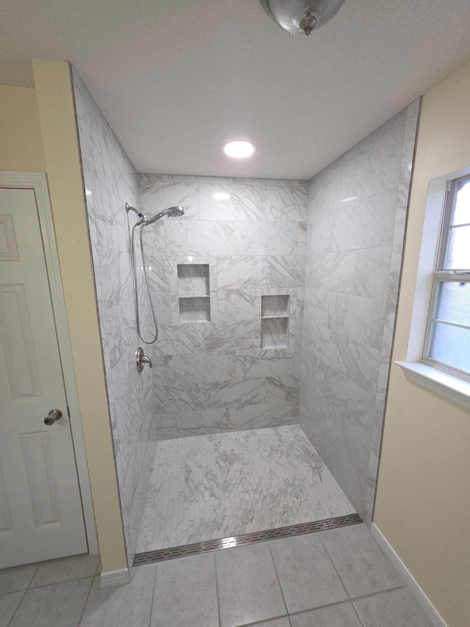 Barrier-free walk-in shower remodel by Paul Jay Construction, a family and veteran-owned bathroom remodeling company