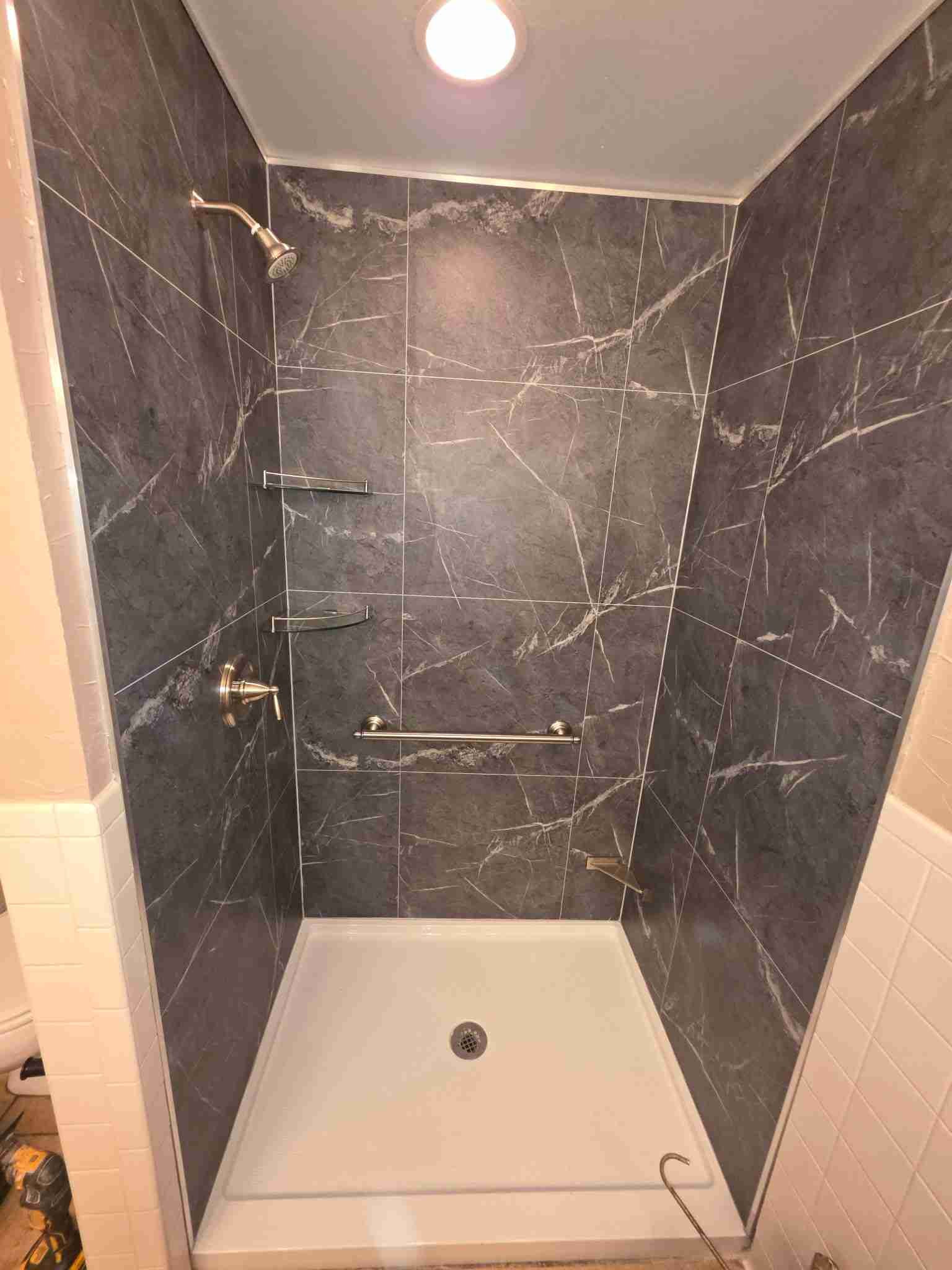 Luxury completed bathroom remodel by Paul Jay Construction – modern fixtures, custom tile work in Waco, Mansfield & Waxahachie, TX
